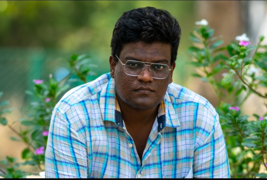Dhinesh R